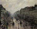 Camille Pissarro Boulevard Montmartre brumosa mañana parisina de 1897